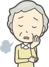 ため息をつくおばあさん